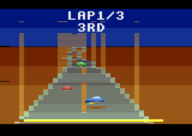 Racing through an orange canyon between tall walls, in third place